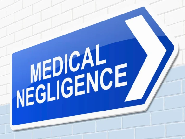 blue sign pointing right reading "MEDICAL NEGLIGENCE"
