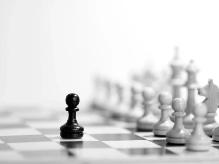 On black pawn placed before all white pawns on a chess board